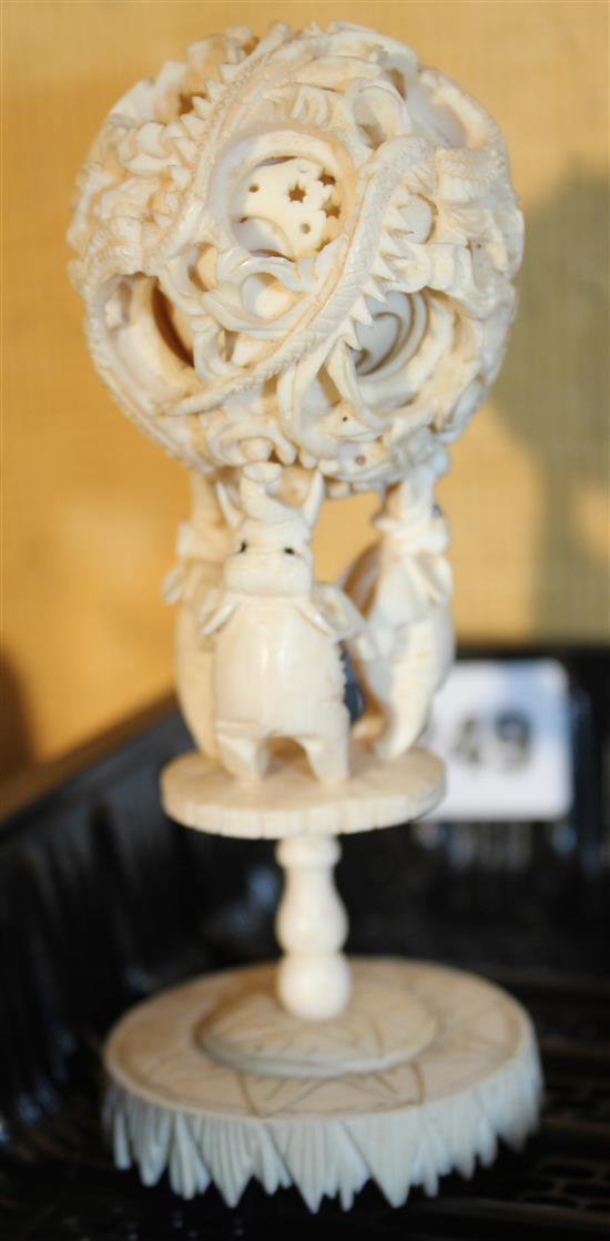 Carved ivory ball on stand